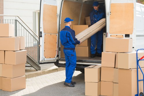 Local team handling furniture pick-up from a Highbury flat with stairs