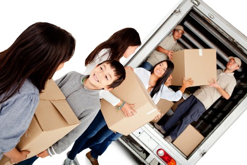 Removal team planning a move in a Highbury residential street