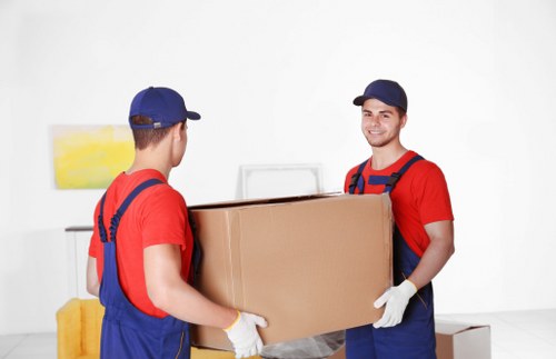 Packed boxes and moving supplies for a Highbury house move