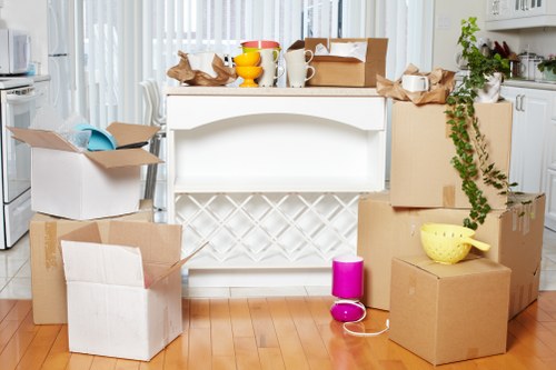Professional furniture pick-up loading old office furniture in Highbury