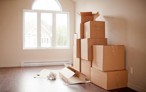 Removal team packing and loading furniture for a Highbury home